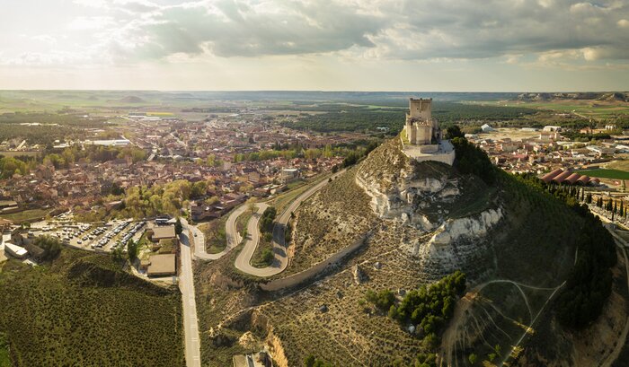 Drive to the castles of La Mancha and Extremadura, including the incredible Peñafiel Castle