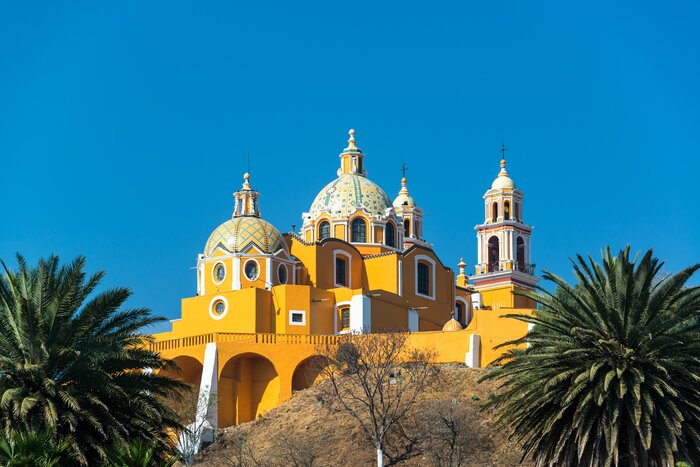 Visit Nuestra Señora de los Remedios Church perched atop Tlachihualtepetl (the Great Pyramid of Cholula)