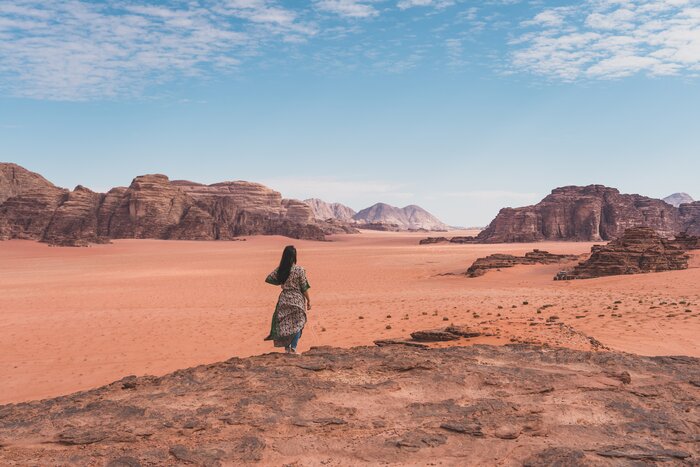 Explore the lunar-like landscape of Wadi Rum on foot, in a Jeep, and atop a camel
