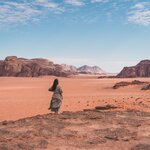 Explore the lunar-like landscape of Wadi Rum on foot, in a Jeep, and atop a camel