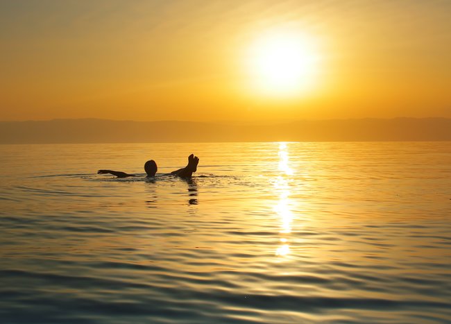 Floating in the Dead Sea, Jordan