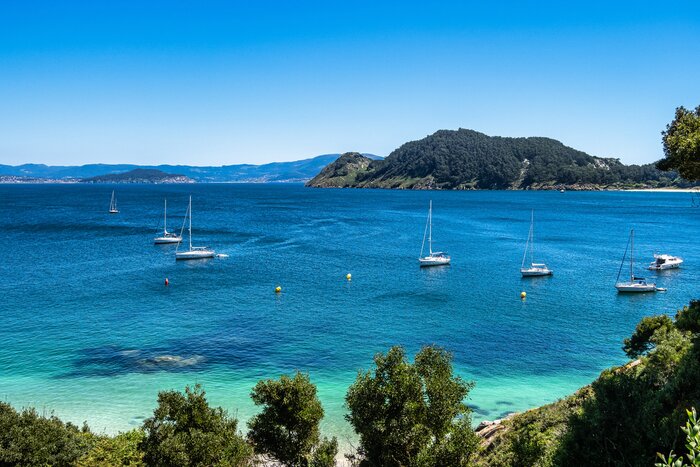 Enjoy the scenery of Galicia, like Praia de Nosa Señora in Cíes Islands