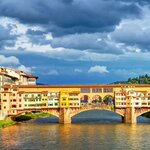 Stroll the Ponte Vecchio over the Arno in Florence for a little shopping