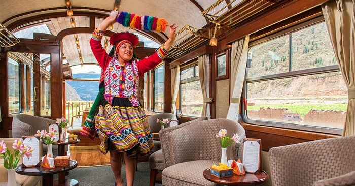 Enjoy live music and dancing on the luxury train to Puno