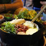 Look for spicy noodle dishes at street food stalls