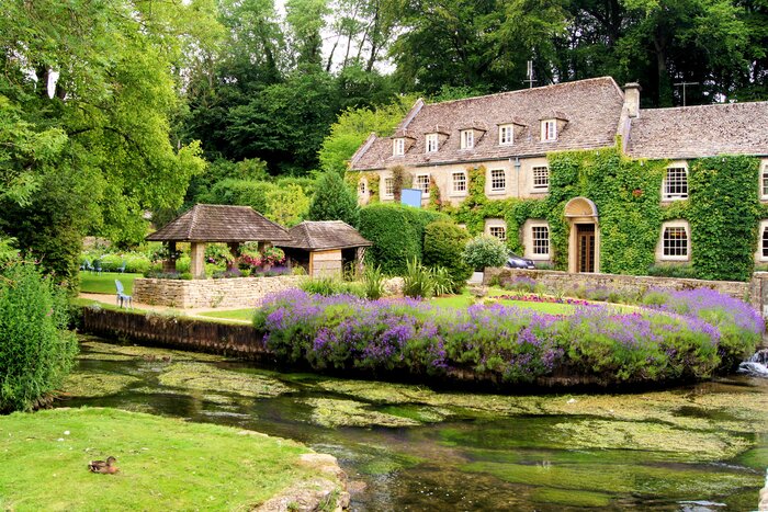 Admire quintessential English countryside as you drive through the Cotswolds