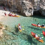 Stop by a hidden beach for snacks and snorkeling
