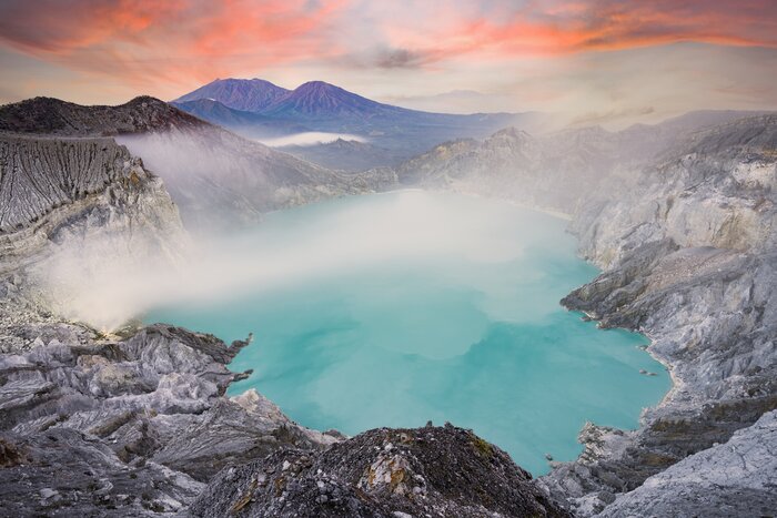 Sunset over Mount Ijen and its blue crater lake—the world's largest acid lake