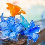 See Murano artisans craft decorative pieces like these flowers