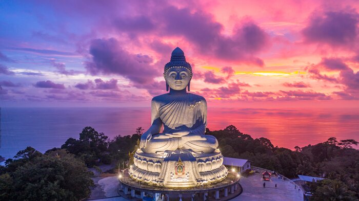 The Great Buddha of Phuket glows after sundown