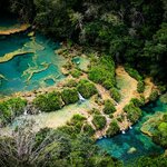 Visit the terraced falls of Guatemala's Semuc Champey and enjoy a refreshing dip