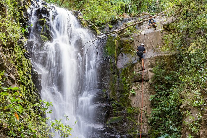 Rappel down a rushing waterfall in Costa Rica