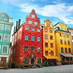 Enjoy a fika in Stockholm's colorful Stortorget square, Old Town