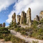 Look up at the towering rock formations in the Valley of the Monks and wait for sunset