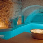 Soak under historic rocks (photo courtesy of Boutique Hotel Ses Bruixes)