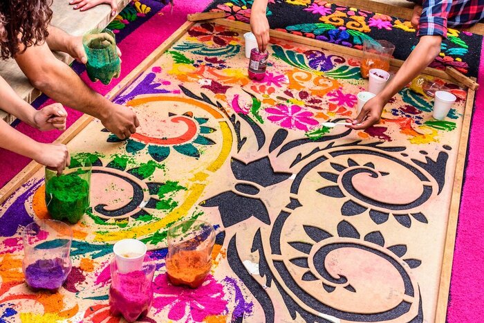 Learn the technique to create colorful outdoor carpets which decorate Antigua during Semana Santa