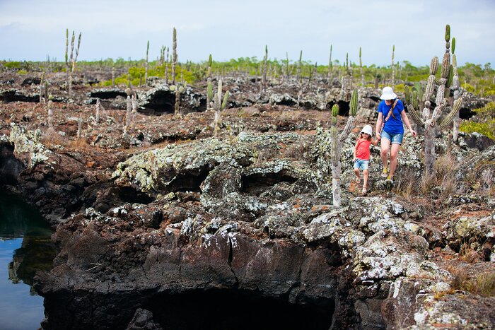 Enjoy spending time with your family as you explore Los Túneles' scenic terrain, Galápagos Islands, Ecuador