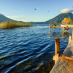 See the volcanoes surrounding Lake Atitlán, like Tolimán and San Pedro