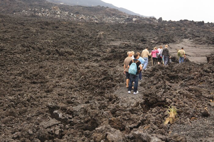 Cross lava fields to trek to the summit of Pacaya volcano, just outside of Antigua