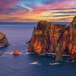 Cruise along the cliffs of Madeira at sunset via private catamaran