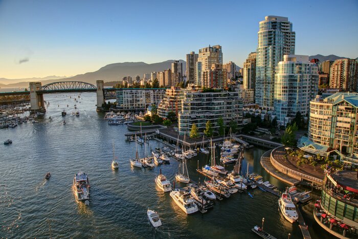 Admire the glittering Vancouver skyline, reflected in the Pacific Ocean