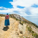 A woman walking on Isla del Sol on Lake Titicaca