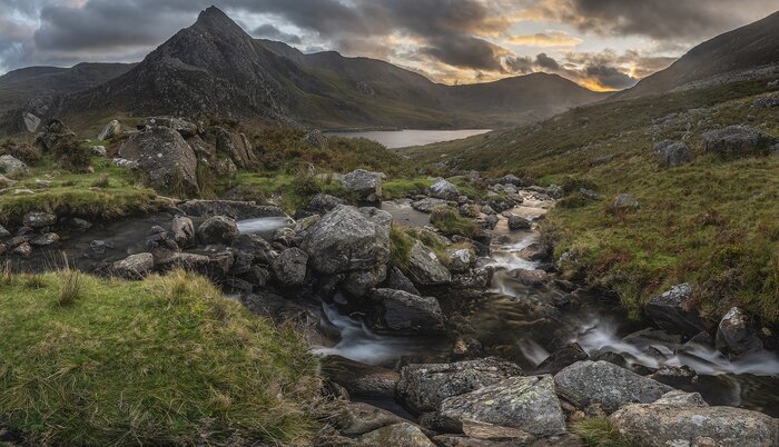A dramatic fall sunset of Llyn Ogwen and Tryfan in Snowdonia National Park, Wales