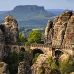 Explore Central Europe by rental car and relish the drive over the Bastei Bridge in Saxon Switzerland National Park en route to Prague