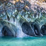 Discover the "Cuevas de Marmol," a series of naturally sculpted caves in the General Carrera Lake