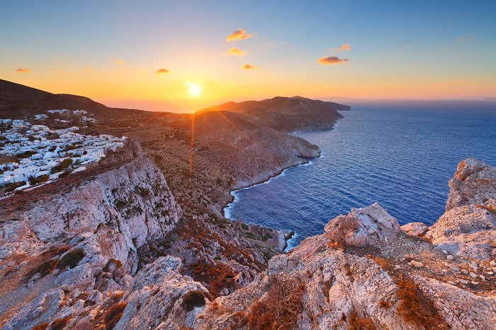 The island of Folegandros and its Chora seen at sunset