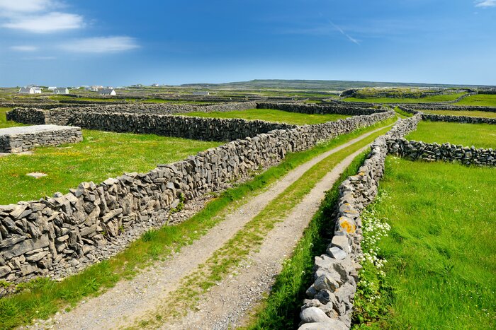 Pedal alongside the many stone walls on Inishmore (Inis Mór), the largest of the Aran Islands in Galway Bay, Ireland
