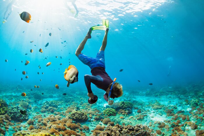 Take the children snorkeling on a family vacation to Thal