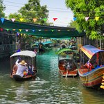 Visit the floating markets in Bangkok, including Khlong Lat Mayom