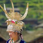 Women of the  Miao ethnic minority tribe wear intricate silver headpieces for important occasions and ceremonies