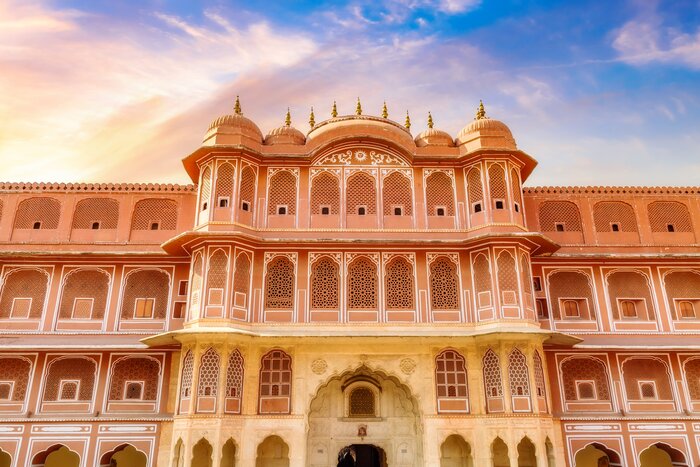 Admire the City Palace's blend of Rajput, Mughal, and European architectural styles in Jaipur
