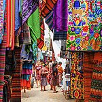 Pick up an authentic souvenir at colorful Chichicastenango market