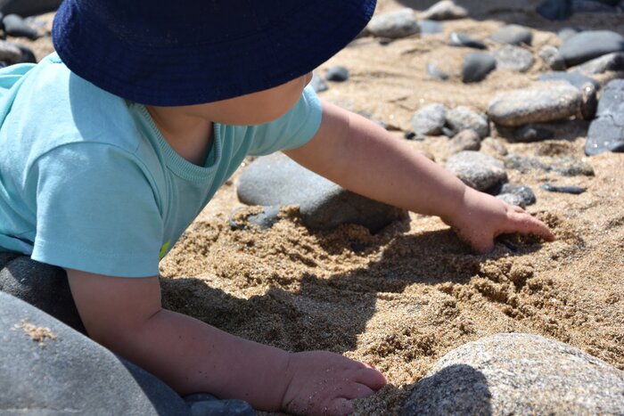 Baby enjoying the beach in Saint-Malo
