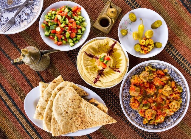 Dig in to delicious Jordanian dishes and roll up your sleeves as you cook alongside locals