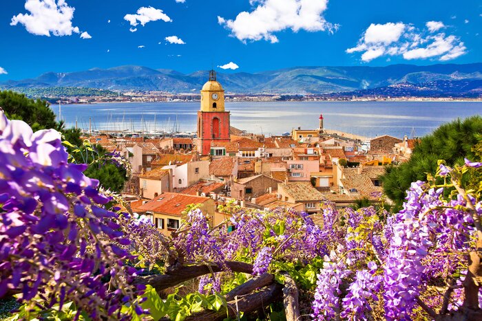 Saint-Tropez village church tower and old rooftops