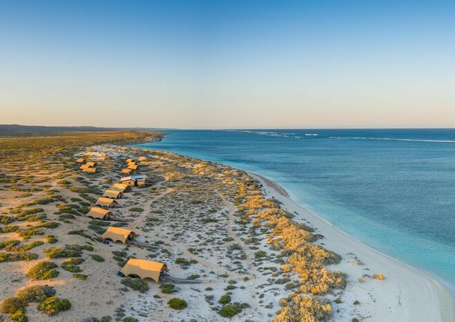 End your adventure on the edge of Western Australia's Ningaloo Reef at a luxury beach camp (photo courtesy of Sal Salis)
