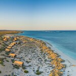 End your adventure on the edge of Western Australia's Ningaloo Reef at a luxury beach camp (photo courtesy of Sal Salis)