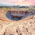 See the ancient theater at Hierapolis, perched atop the terraced pools of Pamukkale in southwestern Turkey