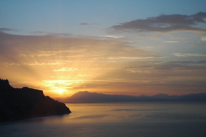 Private sunset boat cruise to the Faraglioni from Sorrento