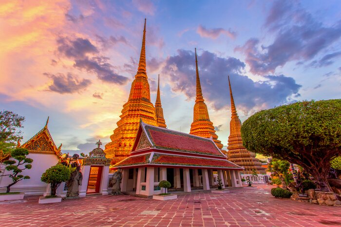 Explore the Grand Palace in bustling Bangkok to start the adventure