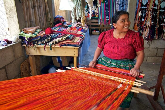 Visit a women's weaving co-op on a village tour of Lake Atitlán