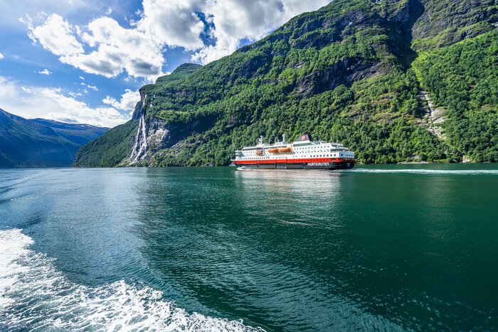 The Hurtigruten cruise liner sailing on the Geirangerfjord