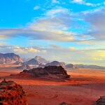 Catch a desert sunset over the Mars-like landscapse of Jordan's Wadi Rum