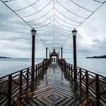 Wooden pier in Frutillar with a view of the Lago Llanquihue in Chile's Lake District