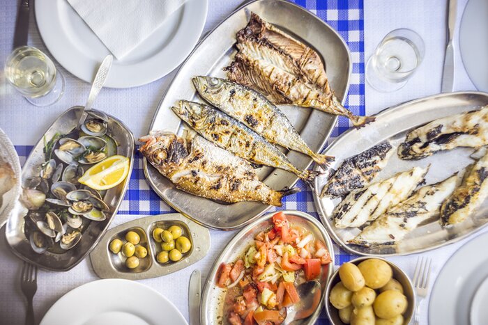Savor exquisite seafood and crisp local white wines in Portugal