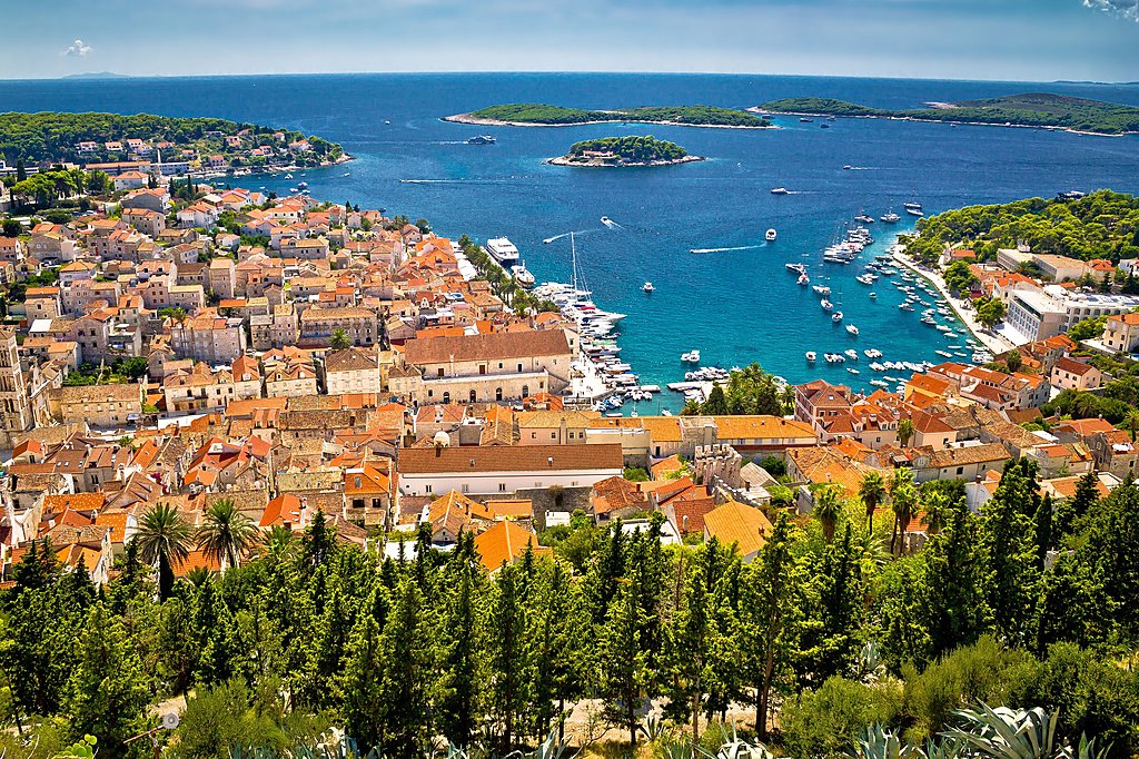 Hvar rooftops, the harbor, and Pakleni Islands